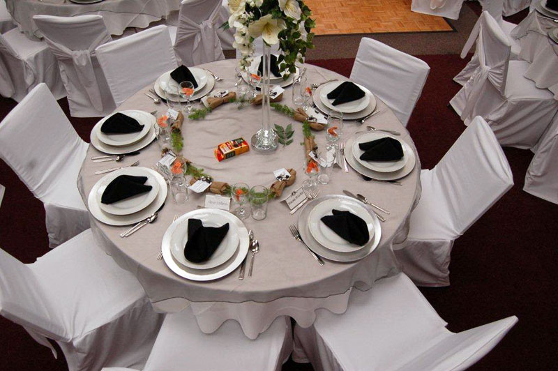 Round table place setting with chair covers